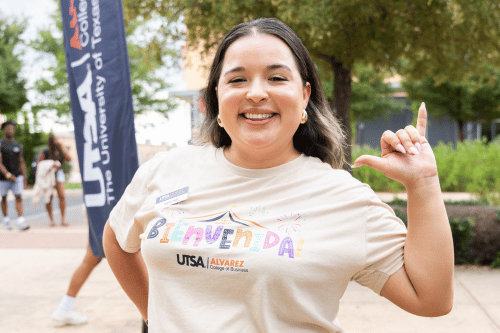 female student in a Bienvenida event shirt