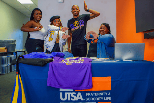 fraternity and sorority students tabling