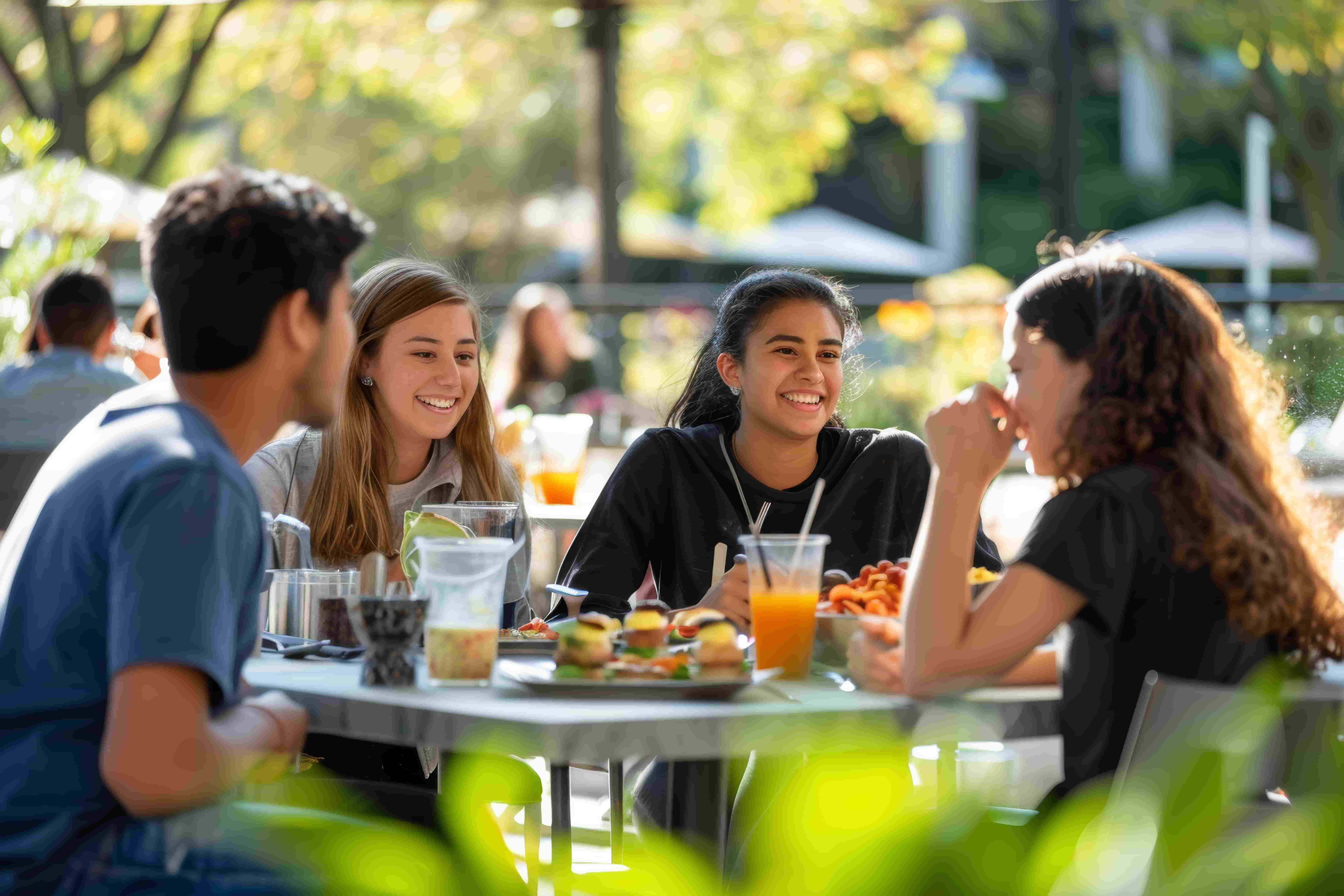 four students eating brunch