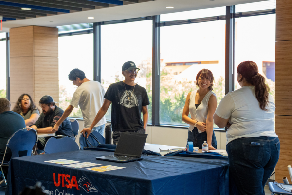 students browsing tables in the Rierwalk Place Student Lounge