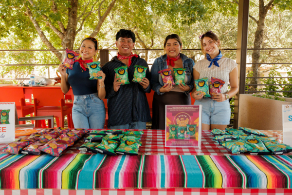 four students tabling at the Roadrunner Cafe