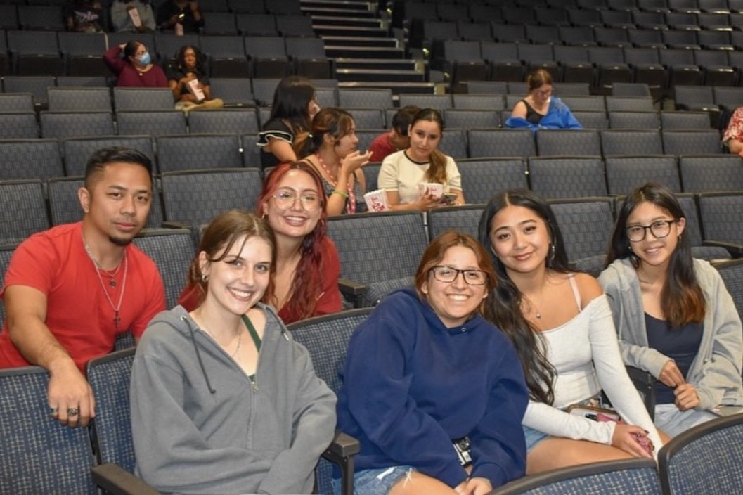 group of students at UCinema in the Retama Auditorium