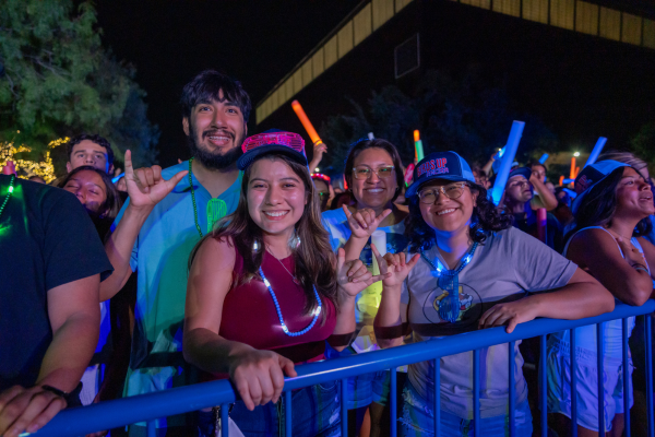 Students enjoying Rowdy Glow with their Birds Up and wearin glow accessories