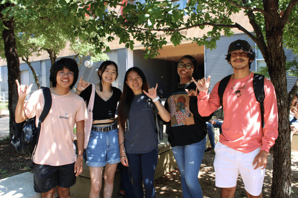 five students under trees